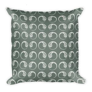 sage and cream colored throw pillow with paisley circles