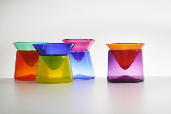 Blown Glass Stacked Martini Glasses Grouped With Orange And Purple Set As The Highlight